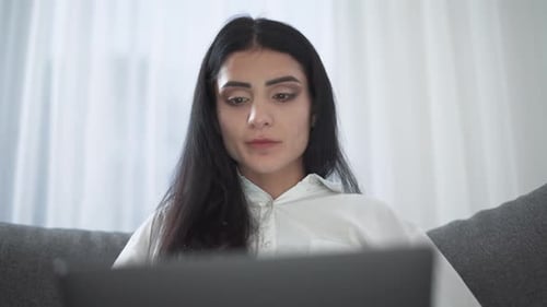 Woman on Laptop at Home