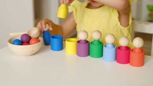 Child Plays With Wooden Montessori Educational Toys