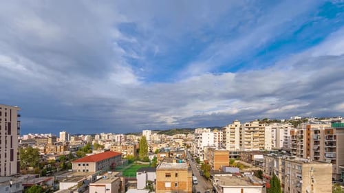Timelapse Over Albanian City with Clouds in the Blue Sky