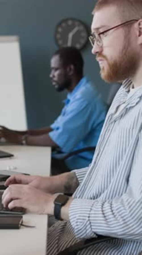 Young Male Programmers At Work