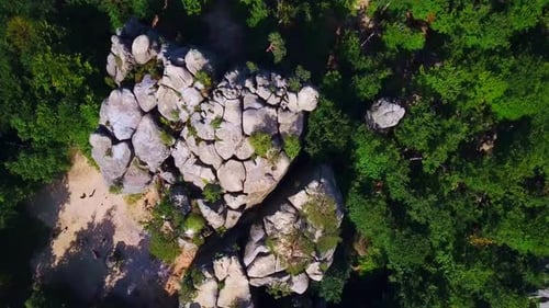 Aerial View of Rock Formation Surrounded by Forest