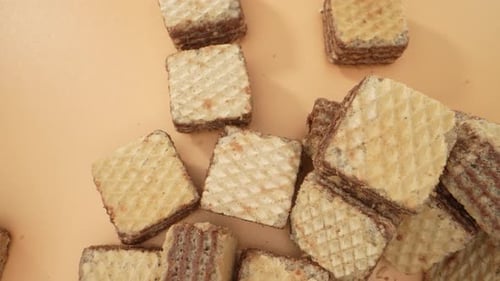 Chocolate Wafer Squares on the floor