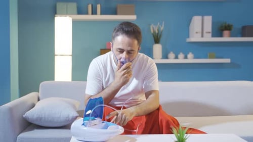 Man sleeping with respirator.