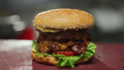 Fast Food View of a Cooked Burger the Process of Cooking a Double Burger with Meat Slow Motion