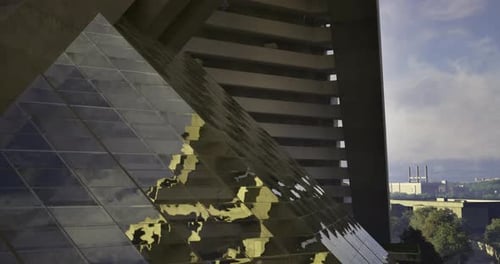 Modern Glass Pyramid Building with Dynamic Light Reflections