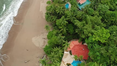 4K Aerial Drone Shot of the Desert Beach of Tambor, Costa Rica.
Low altitude view with Dramatic Sky