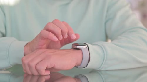 Close up of Man using Smart Watch