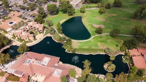 An Overview From the Sky of a Beautiful and Scenic Golf Course on a Bright Sunny Day