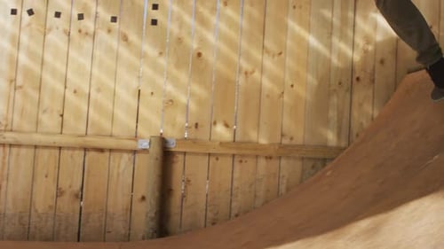 Video of caucasian male skateboarder training in skate park