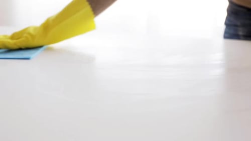 Surface Cleaning with Gloves and Blue Cloth