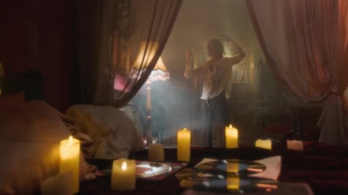Vampire Woman Dancing in her Dimly Lit Room, Warmed by Candlelight
