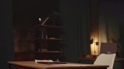 View on Empty Workplace with Laptop and Soft Room Light Atmospheric Cabinet Modern Design at Home