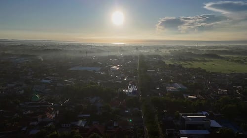 Aerial View of City During Sunrise