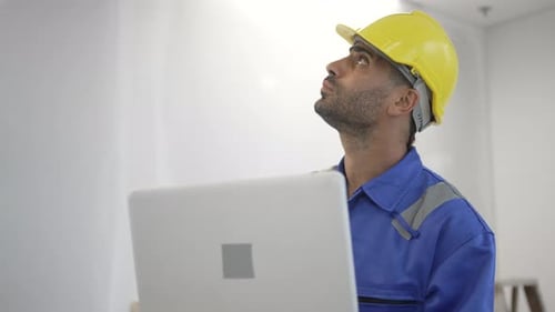 Engineer is working at tower.