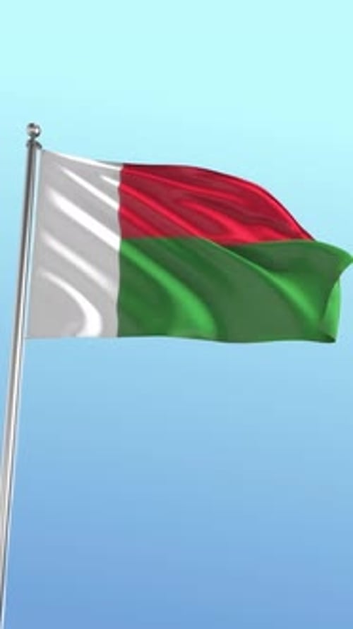 Madagascar Flag Waving Against Blue Sky