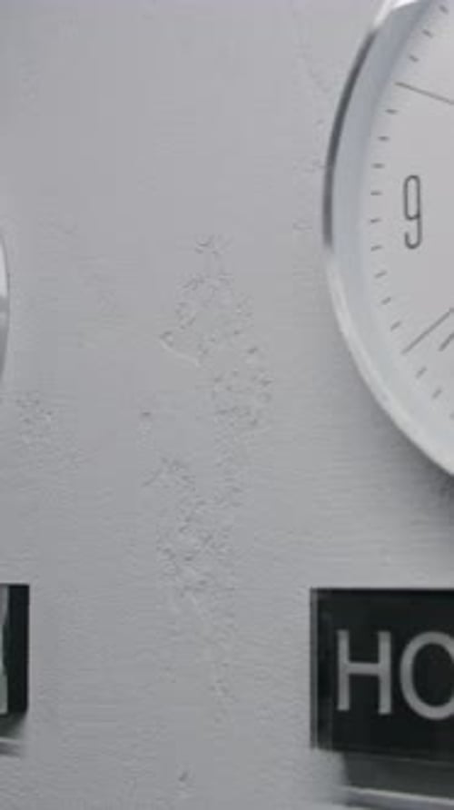 White Watches Show Time Zones of Different Cities