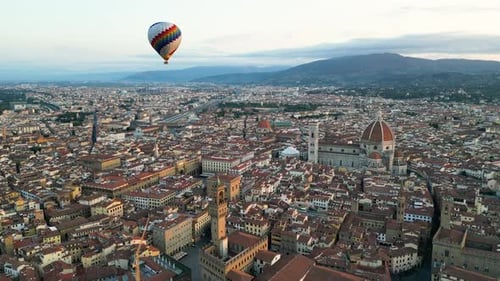 Colorful Hot Air Balloon Epic Flying Above Florence at Sunrise Italy