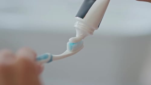 Lady Hand Applying Toothpaste Brush Indoors Closeup Dental Hygiene Healthcare