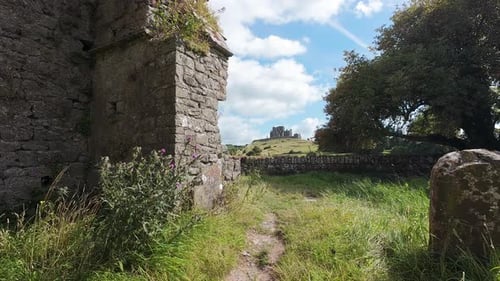 Ireland Epic Locations unusual landscape view of The Rock Of Cashel from Hore Abbey in historic Tipp