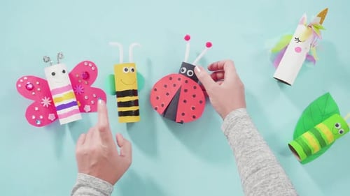 Fun Paper Animal Crafts on Blue Background