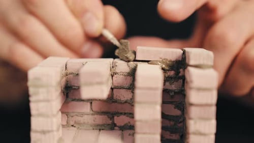 Miniature Brick House Construction with Trowel Tiny Brickwork and Cement Wall