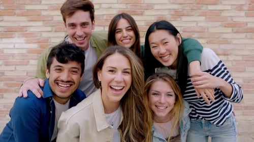 Cheerful Friends Smiling Together in Urban Setting