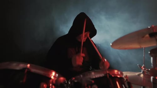 Drummer Musician Plays Drums on Stage