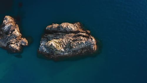 Large Rock in the Deep Blue Sea