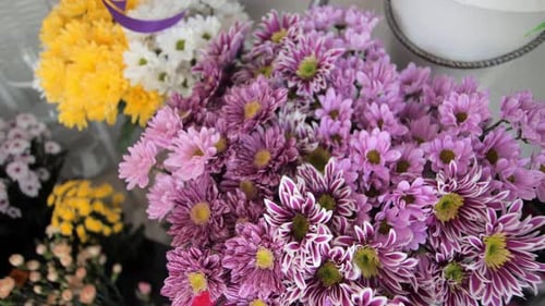 Bouquet with Chrysanthemum Flowers on Display in Light Shop