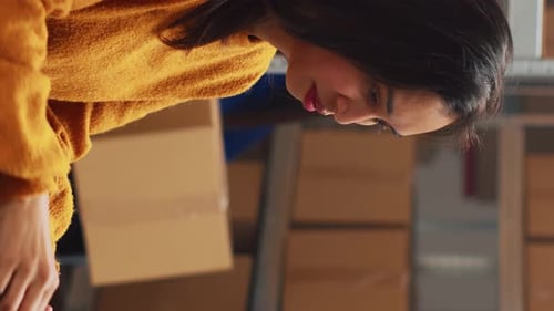 Warehouse Workers with Technology Processing Orders