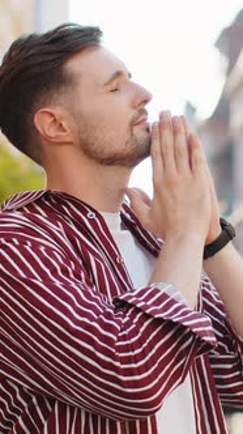 Portrait of Bearded Man Praying Closed Eyes to God Asking for Blessing Help Forgiveness Outdoors