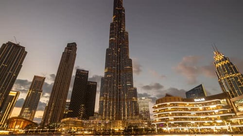 Timelapse Burj Khalifa at the Sunset to Night Time in Dubai United Arab Emirates