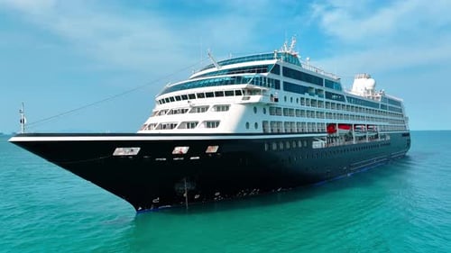 Cruise Ship Sailing in the Ocean on Sunny Day