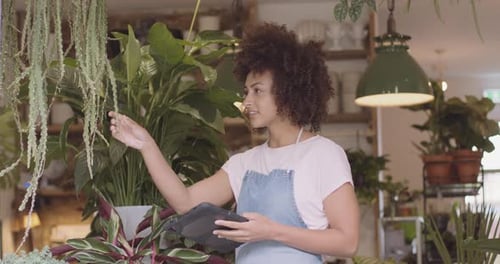 Small business entrepreneur female Store Owner working on digital tablet