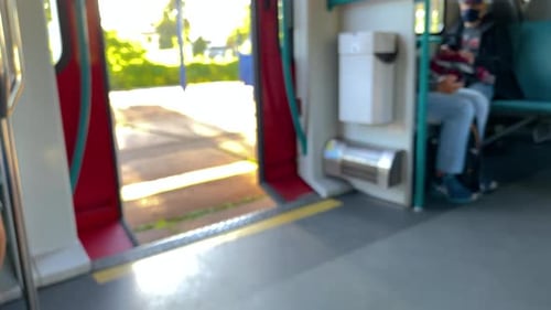 View Of Train Door Closing In Slow Motion With Passengers Sitting Inside In Gdansk, Poland - slow fo