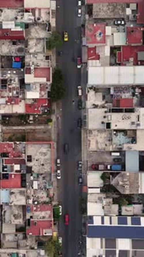 Vertical drone footage captures the bustling streets of Ecatepec, Mexico