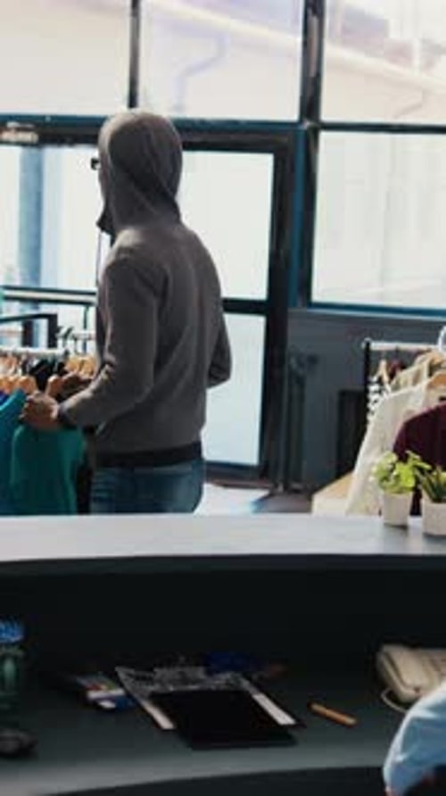 Robber Trying Stole Stylish Shirt