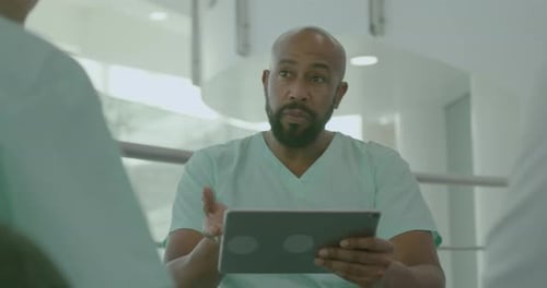 Doctors Meeting in Medical Hospital using Digital tablet Technology