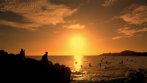 Surfers Rides Big Wave Against Backdrop Beautiful Sunset on the Sea Vietnam