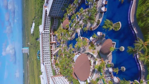 Aerial vertical shot of luxury swimming pool of Hyatt Ziva Cap Cana Hotel Resort with beach