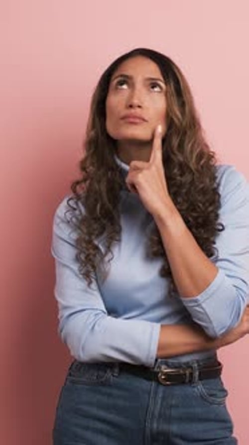 Young Woman with Curly Hair Thinking