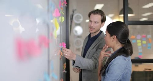 Coworkers brainstorming in an office