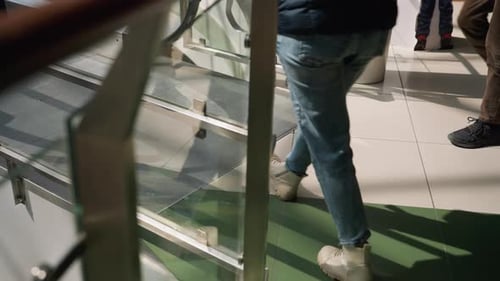 Dynamic Scene of People Moving in a Mall FirstPerson Handheld Perspective