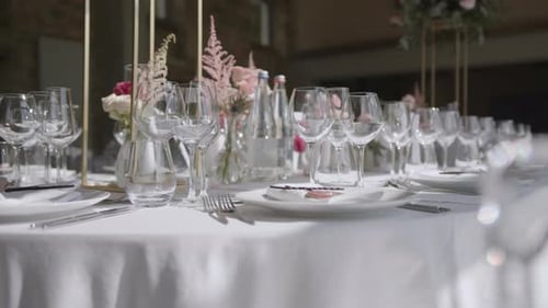 Champagne And Wine Glasses Over Decorated Table Wedding Reception Hall. Close-up Shot