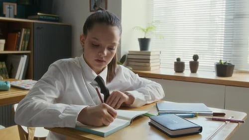 Portrait of Teen Student Girl during Bible Class at School