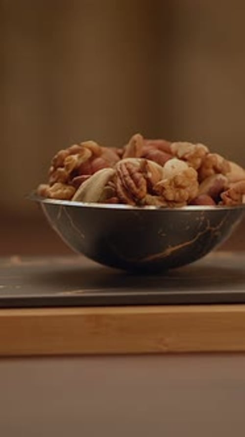 A Selection of Gourmet Assorted Nuts Presented Elegantly in a Beautiful Bowl for Your Enjoyment