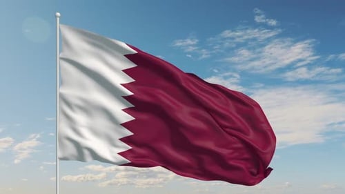 Qatar National Flag in Motion Against a Clear Sky Scene