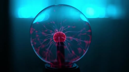 Glowing Plasma Ball with Red Electrical Discharges