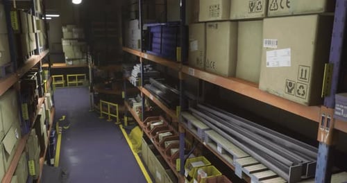 Organized Storage Racks and Supplies in Industrial Warehouse