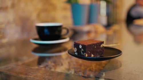 Coffee and Brownie Dessert in a Cafe